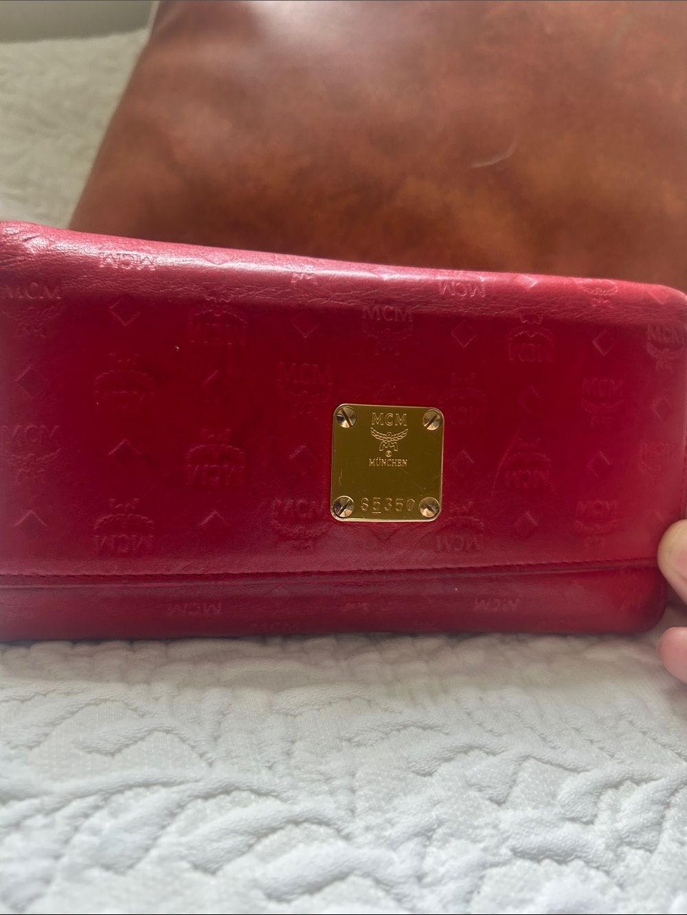 MCM Red Embossed Leather Continental Wallet with Gold Logo Plaque